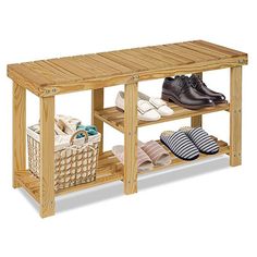 a wooden bench with two baskets and shoes on it's shelf next to the shoe rack