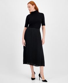 in stock Elegant Stretch Pleated Tiered Skirt, Elegant Black Pleated Skirt, Elegant Black Lined Pleated Skirt, Elegant Formal Pleated Skirt With Stretch, Chic Stretch Pleated Formal Skirt, Elegant Stretch Pleated Skirt For Night Out, Chic Black Tiered Pleated Skirt, Elegant Black Stretch Pleated Skirt, Casual Black A-line Pleated Skirt