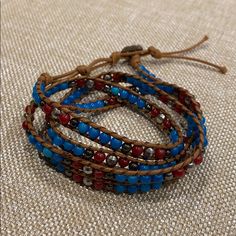 Nwot! Women’s Wrap Around Beaded Bracelet Gorgeous Wrap Bracelet In A Palette Of Colors That Includes Different Shades Of Red As Well As Blue, Aqua, Turquoise And Copper-Color Beads. The Bracelet Is Designed To Wrap Around The Wrist Approximately Five Times. Avoid Contact With Water. Button Clasp. Will Wrap With Care Blue Wrap Bracelet With Colorful Beads As Gift, Blue Wrap Bracelet With Colorful Beads For Gifts, Bohemian Blue Beaded Bracelets With Faceted Beads, Blue Bohemian Beaded Bracelets With Faceted Beads, Bohemian Blue Wrap Bracelet With Colorful Beads, Blue Bohemian Wrap Bracelet With Colorful Beads, Bohemian Blue Wrap Bracelet With Round Beads, Bohemian Wrap Bracelet With Faceted Round Beads, Blue Beaded Bracelets For Festival With Polished Beads