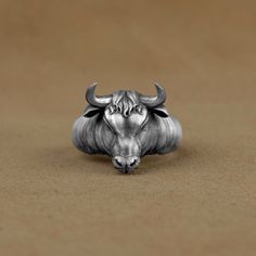 Taurus Silver Ring, Bull Head with Horns Men Ring, Zodiac Men Ring, Animal Lover, Gift For Sister, Taurus Zodiac Ring, Anniversary Gift   Made of 925 silver and handcrafted by hand, this ring is not only an accessory piece that complements your daily elegance, but also has details that will reflect your character and style. It is also a great gift to give to your loved ones on their special days. At SavisSilver, we always give importance to the satisfaction of our customers, we recommend you to Zodiac Rings, Taurus Zodiac, Baby Bag, Sister Gifts, Rings Statement, Animal Lover, Statement Rings, Gifts For Friends, Anniversary Gifts