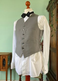 Up for sale is this very dandy looking dove gray 1950's waistcoat. This one would be excellent to combine with any formal daywear like morningcoats or stroller suits. Ideal for weddings or other formal events. The waistcoat is in excellent vintage condition! This waistcoat is approximately size 46 EU/36 US, but please refer to the measurements below for a more accurate idea of the fit. Measurements are taken with the item lying on a flat surface in cm: Shoulders30 Chest43,5 Waist41,5 Length57 (f Mens Vests, Vest Outfits, Dove Grey, Flat Surface, Dandy, Fascinator, Formal Event, Display Homes, Bathing Beauties