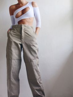 "Vintage, high waisted Dickies cargo pants from the 1990s. Menswear pant size 32x34 with a medium-high rise fit. Condition: Light wear Material: Cotton polyester Brand: Dickies  Color: Khaki Size: 32 x 34 Womens best fit mid rise: size 8 high rise: size 10 Waist measurement: 16\" lying flat Length: 43'\" Inseam: 32\" Hips: 22\" lying flat If you have any questions please feel free to contact me" Dickies Cargo Pants, Cargo Pants, Trousers Women, Mid Rise, Size 10, Khaki Pants, Capri Pants, Pants For Women, Trousers