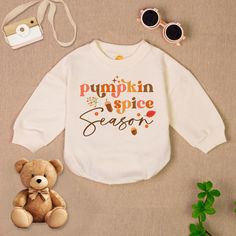 Pumpkin Spice Season Baby Romper Sweatshirt, Thanksgiving Baby Bodysuit, Fall Autumn Baby Romper, Fall Pumpkin Baby Outfit - Handmade - Ships from USA - Materials: 100% CPSIA Compliant and Ethically Made material Light fabric (5.0 oz/yd² (170 g/m Crafted with soft, breathable fabric, this romper ensures your baby stays comfortable through playtimes and nap times alike. Featuring charming designs suitable for all babies, our romper is as adorable as it is practical. Quick Sizing Tip Our rompers a Fall Cotton Onesie With Letter Print, Long Sleeve Onesie With Letter Print For Playtime, Fall Long Sleeve Onesie With Letter Print, Fall Long Sleeve Letter Print Onesie, Cute Letter Print Sweatshirt For Playtime, Cute Sweatshirt With Letter Print For Playtime, Casual Long Sleeve Onesie With Letter Print, Cute Long Sleeve Onesie With Letter Print, Casual Long Sleeve Onesie With Graphic Print