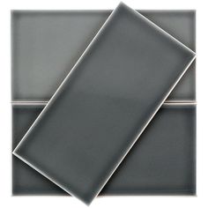 two square gray tiles are shown together