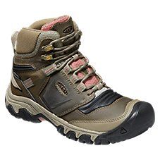 A supportive hiking boot for adventures over tough, rocky trails, KEEN\u00ae Ridge Flex Mid Waterproof Hiking Boots for Ladies come ready for any trek. Waterproof leather and breathable mesh uppers keep feet dry and protected, thanks to quick-dry linings and KEEN.DRY\u2122 waterproof/breathable membrane protection inside. Removable polyurethane footbeds and compression-molded EVA midsoles offer long-lasting, fatigue-fighting cushioning, stability, and support over long-distance treks. KEEN's hee Rugged Waterproof Boots For Outdoor Activities, Waterproof Lace-up Hiking Boots For Camping, Hiking Work Boots With Reinforced Toe, Sporty Waterproof Boots For Adventure, Round Toe Work Boots With Reinforced Toe For Hiking, Insulated Round Toe Boots For Hiking, Waterproof Gore-tex Work Boots For Camping, Rugged Work Boots With Protective Feet For Hiking, Sporty Steel Toe Waterproof Boots For Outdoor Activities