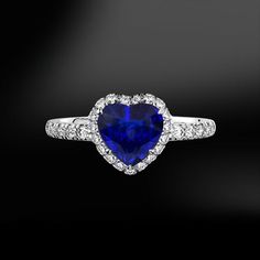 Heart Shape CEYLON SAPPHIRE & Diamond Gold RingThis ring is handmade like all our products, with accuracy by our goldsmiths with over 40 years experience. Included in the price is the opportunity to add a personalised touch by engraving your MR jewellery and make it uniquely yours.ITEM INFORMATION-SapphireWeight:  1.05 carats or 1.92 caratsShape: HeartOrigin: Ceylon (Sri Lanka)-DiamondsColour Grade: GClarity: VVSCut Grade: Excellent-Gold 18KCertificate avaialble on request.All ring sizes ava Gia Certified Heart Cut Diamond Anniversary Ring, Heart Cut Diamond Halo Ring For Anniversary, Luxury Heart Cut Gia Certified Jewelry, Luxury Gia Certified Heart Cut Jewelry, Gia Certified Heart Diamond Rings, Gia Certified Heart Cut Diamond Ring, Gia Certified Heart-shaped Diamond Jewelry, Heart Cut Sapphire Ring Fine Jewelry, Heart Cut Sapphire Ring In Fine Jewelry Style