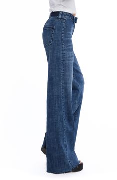 Tailored with an easy-fitting wide leg, these stretch-denim jeans feature a flat front and two back patch pockets. 32" inseam; 23" leg opening; 10 1/4" front rise Zip fly with button closure Back patch pockets 69% cotton, 27% REPREVE® recycled polyester, 3% rayon, 1% spandex REPREVE recycled polyester is made from 100% post-consumer recycled plastic bottles Machine wash, tumble dry Imported Wide Leg Dark Wash Flare Jeans, Full Length Denim Flare Jeans, Relaxed Fit Denim Blue Flare Jeans, Denim Blue Relaxed Fit Flare Jeans, Denim Blue Full Length Flare Jeans With Five Pockets, Denim Blue Wide Leg Pants, Back Patch, Recycle Plastic Bottles, Marbella