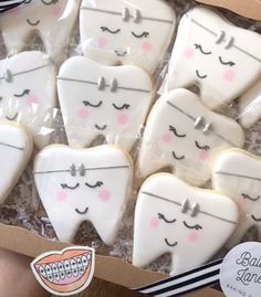 decorated cookies in the shape of tooth and braces