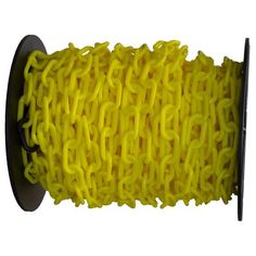 a spool of yellow braiding rope on a white background