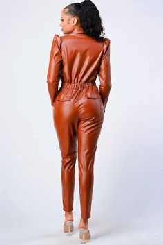 Women's Bodycon Leather Jumpsuit In Brown The Silvie women's bodycon leather jumpsuit is a style you can't miss. This bodycon jumpsuit has a front zip closure, two side pockets and two back pockets. It comes in one size available. The leather material used in this luxury clothing item makes it look more stylish than other similar designer jumpsuits. Wear this stylish jumpsuit to the office or on a night out--you'll love it! Outer Shell: Real Leather Leather Type: Lambskin Leather Finish: Semi-an Fitted Jumpsuits And Rompers For Office In Fall, Fitted Office Jumpsuits And Rompers For Fall, Fitted Fall Jumpsuits And Rompers For Office, Brown Jumpsuits And Rompers For Fall, Brown Jumpsuit For Fall Party, Fitted Faux Leather Jumpsuits For Fall, Fitted Faux Leather Jumpsuits And Rompers For Fall, Fall Office Jumpsuits And Rompers With Pockets, Fall Party Jumpsuits And Rompers With Pockets