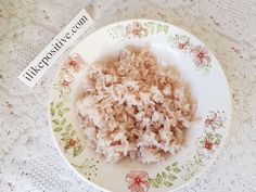 rice in a bowl on a doily with a tag that says, i love rice