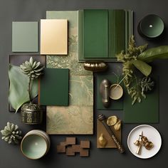 a table topped with lots of green and gold items