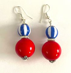 Red, Blue and White Stripe Bead Earrings.  Who doesn't love red, white and blue.  Great fashion statement. Red Beaded Earrings For Beach, Red Round Earrings For Beach, Patriotic Blue Beaded Earrings As Gift, Blue Patriotic Beaded Earrings As Gift, Red Round Beach Earrings, Blue Patriotic Summer Jewelry, Red Patriotic Beaded Earrings, Patriotic Blue Beaded Earrings, Red And Blue Handmade Earrings