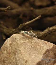 Give Her a Wedding band that is as unique as she is! This Sterling silver women's band features a stunning Emerald and a charming Maple leaf. Adjustable Silver Emerald Ring For Wedding, Branch Engagement Ring, Rings Stone, Hammered Wedding Bands, Twig Engagement Ring, Dainty Wedding Ring, Hammered Silver Ring, Hammered Band, Gift For Bride