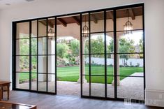 an open living room with sliding glass doors