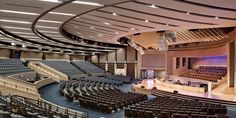 an empty auditorium filled with lots of seats