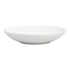 a white bowl sitting on top of a table