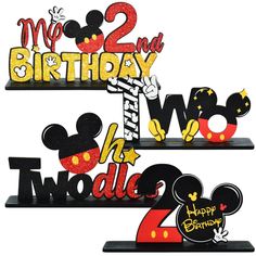 two mickey mouse birthday signs are shown with the numbers 2, 3, and 5 on them