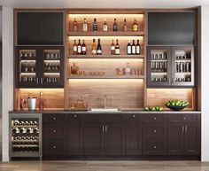 an image of a kitchen with wine bottles on the wall and cabinets in front of it