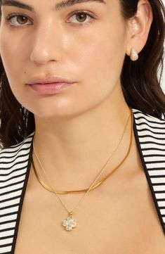 A clover pendant necklace crafted in 14-karat-gold or silvertone plate is a must-have staple for your collection. 15" length; 4" extender; 1/2"W x 1/2"L pendant 14k-gold plate or silvertone plate/glass Imported Classic 14k Gold Charm Necklaces, Elegant Plated Charm Necklaces, Gold-tone Initial Pendant Charm Necklaces, Tarnish Resistant Yellow Gold Charm Necklace, Gold Plated Charm Necklace With Pearl Pendant, Calpak Luggage, Clover Pendant, Concert Looks, Necklace Craft