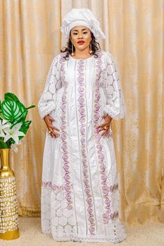 Description: This magnificent broderie simple fabric custom African dress is perfect for any occasion you want to look your best. Material: broderie  simple fabric Important Note: For broderie mix with Bazin and garniture mix clothes only: Depending on the availability of the( fabric) / Garnitures (TRIMS) may be different than the one in the picture. However, the dress will be sewn exactly in the style and colors shown. You can always request to see the fabrics or trims before we start by sending us a message along with your order. PROCESSING: We usually take 6- 8 BUSINESS DAYS to make the dress. SHIPPING: We use DHL shipping with tracking and text updates. (3 to 5 days) SIZING: What we need from you We have a sizing Chart in the images. Scroll to the right. (Providing your desire measurem Eid Dresses With Resham Embroidery And Lace, Traditional Lace Dress With Floral Embroidery, Elegant Cotton Dresses For Eid, White Cotton Dress For Eid, Traditional Embroidered Lace Dress, Traditional Lace Dress For Eid, White Lace Dress For Eid, Traditional Cotton Dresses With Tonal Embroidery, Elegant Cotton Dress With Geometric Embroidery