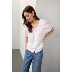 White (100% Cotton). Top. 3/4 sleeves. Crew neck. Front button closure. 22.5" from shoulder to hemline. Imported. Casual Puff Sleeve Top With Button Closure, Half Sleeve Blouse For Day Out, Casual Spring Puff Sleeve Top With Button Closure, Casual Spring Puff Sleeve Top, Everyday Spring Blouse With Buttons, Spring Everyday Blouse With Buttons, Spring Button-up Puff Sleeve Top, Everyday Spring Blouse With Button Closure, Spring Puff Sleeve Top With Button Cuffs