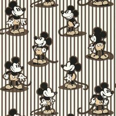 many mickey mouses are sitting together on the ground with stripes in front of them