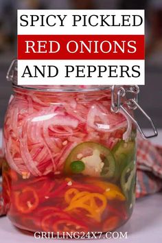 pickled red onions and peppers in a jar with text overlay that reads spicy pickled red onions and peppers