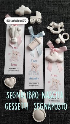 some baby items are laid out on a table with the words segmabiro nagita gessetti segnapostatoto