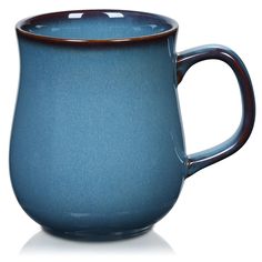 a blue coffee cup with brown rims