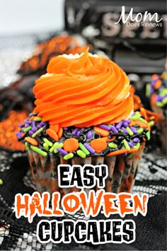 an easy halloween cupcake with orange frosting and sprinkles on top