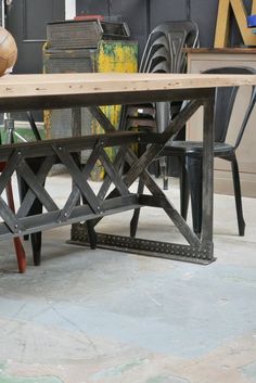 a table made out of metal and wood