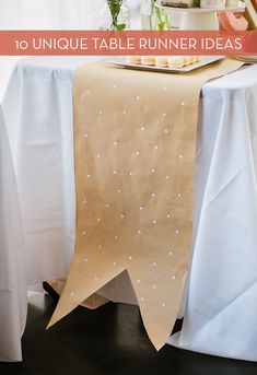 a table topped with a plate of food next to a vase filled with flowers and fruit