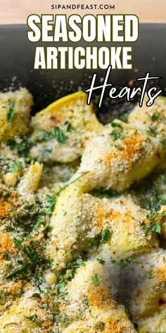 seasoned artichoke hearts with parmesan cheese and herbs in a skillet