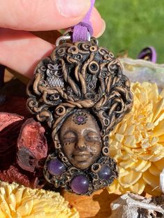 "This handmade, unique talisman is representing the tree of wisdom,tree of knowledge, &the wisdom of Sophia. Her amethyst are for protection, purification, and divine connection. The chakras associated with this talisman or third eye, crown and the etheric. The element of amethyst is wind. The roots of mind are symbolic while wrapping around the \"3\"nuggets. Three represents the All, the triad, the beginning,middle and the end, the unification of mind, body and spirit. Her owl is her totem for Bohemian Hand Cast Necklace For Gift, Hand Cast Bohemian Necklace As Gift, Handmade Mystical Amethyst Crystal Necklace, Handmade Mystical Amethyst Crystal Necklaces, Bohemian Crystal Necklaces With Charms As A Gift, Handmade Mystical Purple Crystal Necklace, Handmade Amethyst Amulet Crystal Necklace, Handmade Spiritual Amethyst Crystal Necklace, Purple Spiritual Crystal Necklace For Festivals