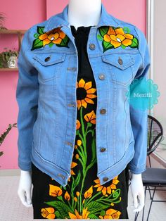 "Mexican floral embroidered jacket. Made out of a soft, durable denim, with comfortable stretch. Decorative button-flap faux pockets at chest. Side welt pockets in front. Size- Small Measurements: Bust- 33\" Length- 20\" 🧺Care Instructions: We recommend hand washing separately, hang to dry. 📸Additional photos can be provided upon request. 👗Always allow a little room and consider your own measurements before purchase to avoid any problems. If measurement are exact chances are the garments will Blue Embroidered Relaxed Fit Outerwear, Blue Embroidered Outerwear With Relaxed Fit, Embroidered Relaxed Fit Denim Jacket, Embroidered Denim Outerwear With Relaxed Fit, Denim Blue Cotton Outerwear With Floral Embroidery, Relaxed Fit Embroidered Denim Outerwear, Embroidered Denim Jacket In Relaxed Fit, Floral Embroidered Medium Wash Denim Jacket, Medium Wash Cotton Denim Jacket With Floral Embroidery