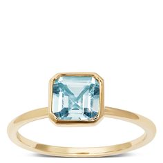 A high polish band presents a bezel set square aquamarine for a sweet pop of color. The band is approximately 1mm wide. Square Aquamarine Ring, Aquamarine Ring, Luxury Timepieces, Aquamarine Rings, Ring Size Guide, Jewelry Cleaner, Cleaning Jewelry, Bezel Setting, Aquamarine