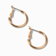 These trendy hollow tube hoop earrings are here to dress up your look or keep it casual chic. They will pair nicely with your other gold-tone accessories or you can mix them in with other finishes for a more eclectic style.Finish: Gold-tone Diameter: 20MM Closure: ClutchbackMaterial: Metal - Claire's Gold 20MM Tube Hoop Earrings Adjustable Clip-on Small Hoop Earrings, Tube Hoop Earrings, Fashionable Jewelry, Eclectic Style, Jewelry And Accessories, Jewelry Earrings Hoops, The Gold, Casual Chic, Gold Tones