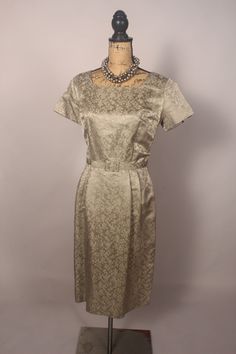 Gorgeous vintage 50's silver-green silk jacquard dress with matching belt, square neckline, and original metal zipper that zips up the back!  No label, but beautifully made!  And in amazing condition... Bust: 40" Waist: 30" Hips: 40ish" Length: 43" Sleeve: 7" Necklace not included. 3390 Vintage Formal Belted Dress, Vintage Belted Formal Dress, Vintage Silver Dress For Formal Occasions, Silver Vintage Dress For Formal Occasions, Silver Vintage Dresses For Formal Occasions, Silver Vintage Formal Dresses, Mums Wedding, Jacquard Dress, 50s Fashion