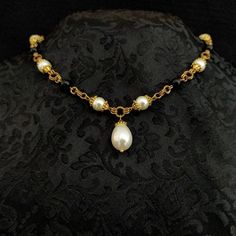 Hey, I found this really awesome Etsy listing at https://www.etsy.com/listing/1000668034/medieval-renaissance-necklace-black Elegant Baroque Necklace With Historical Design, Classic Gold Beaded Necklace With Pearl Pendant, Victorian Pearl Drop Necklace, Antique Formal Pearl Chain Necklace, Antique Pearl Chain Necklace For Formal Occasions, Gold Baroque Pearl Necklaces, Vintage Gold Jewelry For Opera, Vintage Gold Pearl Necklace With Pearl Drop, Elegant Gold Necklace With Historical Design