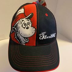 a baseball cap with an image of a cat in the hat on it