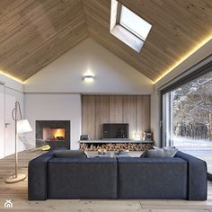 a modern living room with wood paneling and large windows