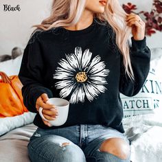 Introducing our daisy floral crewneck sweatshirt, featuring a trendy daisy aesthetic graphic design that brings a touch of nature to your wardrobe. This cute daisy flower sweatshirt is perfect for any daisy lover, combining comfort and style in one versatile piece. Whether you're looking for a cozy daisy sweater for chilly days or a unique gift, this sweatshirt is an excellent choice. Our flower sweatshirts are crafted for quality and durability, making them ideal for everyday wear. Embrace the Summer Daisy Print Crew Neck Shirt, Spring Crew Neck Top With Daisy Print, Aesthetic Daisy Flower, Summer Crew Neck T-shirt With Daisy Print, Casual Daisy Print T-shirt For Spring, Daisy Aesthetic, Aesthetic Daisy, Daisy Sweater, Daisy Sweatshirt