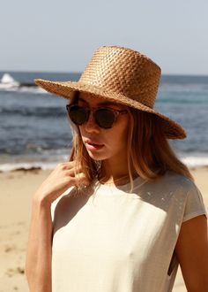 Our Catalina is a short-brim straw hat featuring a woven trim, a perfect sunny-weather staple. Ideal for those long days of sunlight featuring afternoons picnics and everything in-between. Lightweight Made from Straw *Sizes vary but measure about S/M: 21 IN M/L: 23 IN Spring Coastal Boater Hat Made Of Toquilla Straw, Summer Fedora Panama Hat Made Of Palm Leaf, Natural Straw Hat For Vacation Warm Weather, Palm Leaf Straw Hat For Vacation, Natural Straw Hat For Beach And Warm Weather, Casual Woven Straw Hat For Warm Weather, Natural Straw Hat For Beach In Warm Weather, Straw Hat For Beach Season Day Out, Lightweight Straw Hat For Day Out