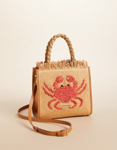 That fun embroidered crab is just the beginning to our beautiful woven straw Dune Satchel bag! The recessed zipper panel opens a zip and two stacked slip pockets. Plus, the removable strap adjusts to shoulder crossbody lengths. This woven satchel topped with fringe is perfect for dressing up laid back days and casual n Spartina 449, Back Day, Woman Weaving, Gingham Print, Satchel Bags, Crab, Straw Bag, Straw, Satchel