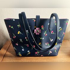 Almost Brand New Kate Spade Wildflower Collection. Well Maintained Bag. Rare Find. Open Top With A Turn Lock Clasp Closure. Size: 10”W * 9”H * 5”D Blue Floral Print Shoulder Bag For Everyday, Everyday Blue Floral Print Shoulder Bag, Elegant Floral Print Shopping Bag, Elegant Floral Print Tote Bag, Kate Spade Multicolor Spring Bags, Kate Spade Floral Print Bags For Spring, Kate Spade Spring Floral Print Bag, Blue Floral Print Shoulder Bag For Spring, Kate Spade Spring Tote Shoulder Bag