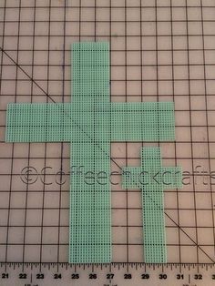 the cross is made out of plastic and has been cut into smaller pieces to make it easier