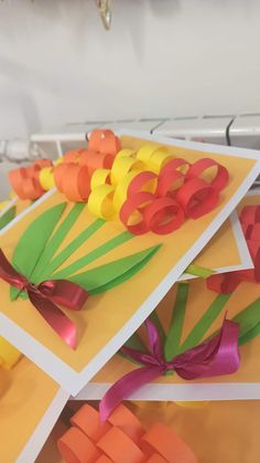 several pieces of paper that have been made to look like carrots and palm leaves