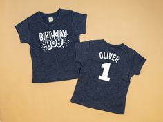 This listing includes: - a heathered navy tshirt - Birthday Boy graphic on the front - Name and Number on the back How to Order In the personalization box, please include: 1. Name 2. Number 3. Date Needed ** Size ** Please see size chart in listings ** How Long ** Generally ships within 3 days. Please always let us know if your need by date is within 2 weeks. We have UPS shipping options available at checkout. Blue Graphic Print T-shirt For First Birthday, Blue Crew Neck T-shirt For First Birthday, Toddler Birthday Outfit, Boy Birthday Shirt, Bowtie And Suspenders, 2 Number, First Birthday Shirts, Baby Boy 1st Birthday, Ups Shipping