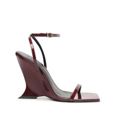 The Sienas feature a unique and modern design that blends futuristic aesthetics with traditional elements. The heel has a bold, geometric look, giving the sandals an almost architectural feel. While the front strap is a simple, thin band that crosses over the toes, the ankle strap is similarly slim but wraps around the ankle for added support. The Sienas are both edgy and elegant, ideal for someone looking to make a bold fashion statement. Pair them with modern, minimalistic outfits for a striking contrast.
Materials: Leather Upper | Leather OutsoleHeel Type: High HeelHeel Style: WedgeToe Style: Square ToeClosure Type: Buckle UpCounter Type: ClosedHeel Height: 4,4 In | 113 mmSKU: S2203100010006 Minimalistic Outfits, Autumn Trends, Brown Suede Boots, Case Closed, Trending Sneakers, Fall Shopping, Tall Boots, Black Booties, Siena